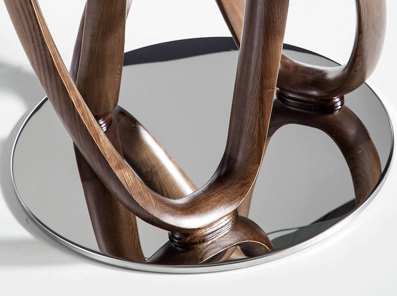 Rundt spisebord i glas, træ og rustfrit stål